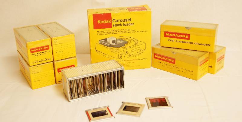 lot 2486 image: KODAK Carousel stack loader (in box) & 7 Kodak Slide Magazines (in boxes) WITH VINTAGE SLIDES See photos