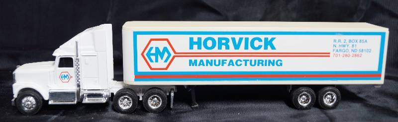 lot 7273 image: ERTL Die Cast Replica - Horvick Manufacturing Semi Trailer Truck - #1357-7513
