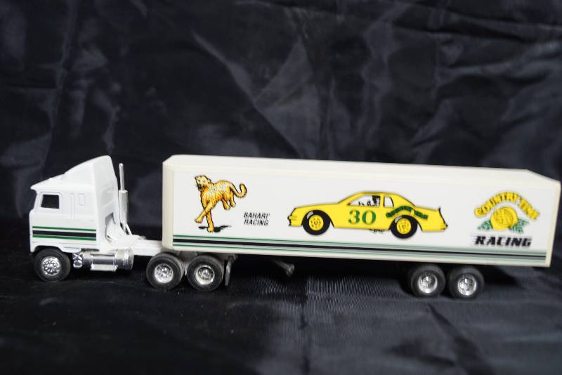 lot 7277 image: ERTL 164 Die Cast Replica MACK Ultra Liner w Sleeper Truck w trailer Bahari Racing #30 Country Time Lemonade