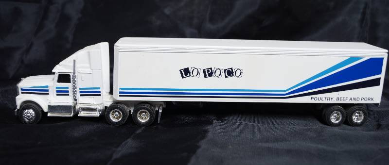 lot 7288 image: ERTL Die Cast Replica International Semi Truck 0459G - w LO POCO Trailer 9200 8812