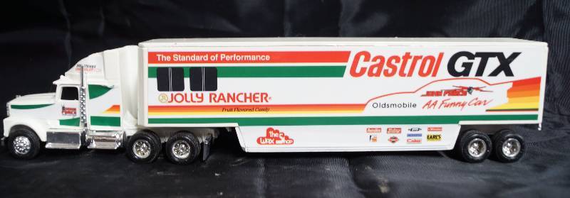 lot 7354 image: ERTL - Die Cast Replica - International Navistar Semi Truck w Trailer - Castrol GTX AA Funny Car Racing 9200-8810