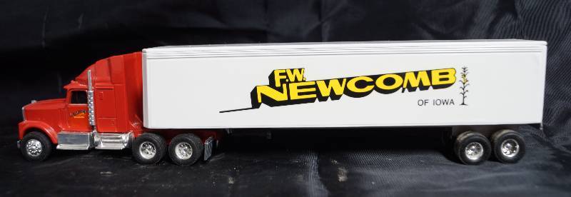 lot 7358 image: ERTL - Die Cast Replica - 1890G - w Trailer 9200 8812 - F.W. Newcomb of Iowa - Cool