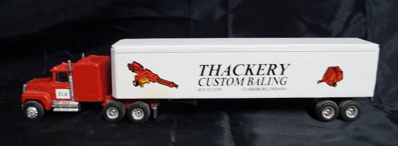 lot 7359 image: ERTL - Die Cast Replica Semi Truck w Trailer THACKERY Custom Bailing - Indiana WOW
