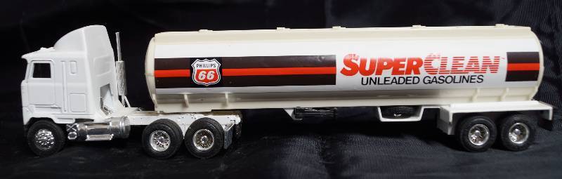lot 2222 image: ERTL - Die Cast Replica - 164 MACK Ultra-Liner w Sleeper Semi Truck w Trailer - Phillips 66  Gasoline Tanker