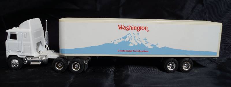 lot 2223 image: ERTL - Die Cast Replica - 164 MACK Ultra-Liner w Sleeper Semi Truck w Trailer - Washington Centennial Celebration