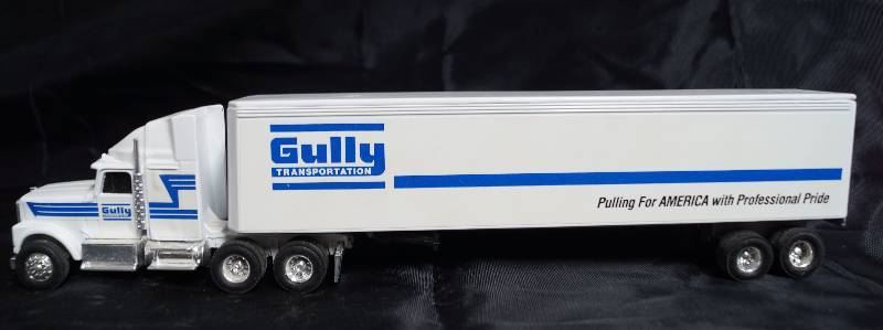 lot 2225 image: ERTL - Die Cast Replica - International Navistar Semi Truck 2450G w Trailer - Gully Transportation - 8200 8812
