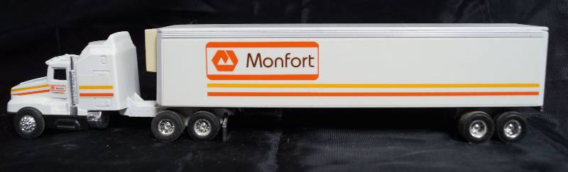 lot 2244 image: ERTL - Die Cast Replica - Kenworth T600A - 2800G - Semi Truck w trailer  - Monfort Transportation - Refrigerated
