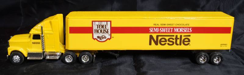 lot 2252 image: ERTL - Die Cast Replica International Navistar Semi Truck & Trailer - NESTLE TOOL HOUSE MORSELS - WOW