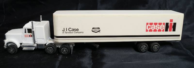 lot 2265 image: ERTL - Die Cast Replica 0687G - Semi Truck W Trailer - JI CASE - Tenneco Company - case - COOL