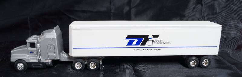 lot 2285 image: ERTL - Die Cast Replica Kenworth T600A - 1079G - Direct Transit - Sioux City, Iowa - WOW