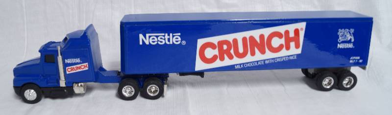 ERTL Die Cast Replica Kenworth T600A Semi Truck and Trailer NESTLE CRUNCH SWEET Butler County ERTL Die Cast Semi Truck Collection Other Fine Collectibles Auction Equip Bid
