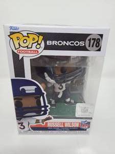 lot 53 image: New In Box Funko Pop Russell Wilson #178  Premium Vinyl Figure