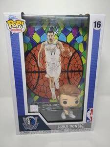 lot 107 image: New In Box Funko Pop Luka Doncic with Prizm Stained Glass Giant Basketball Card & Premium Vinyl Figure
