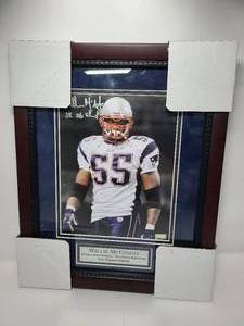 lot 82 image: Signed & Framed Willie McGinest New England Patriots Photo