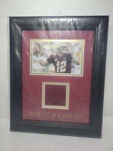 lot 83 image: Matt Ryan 13 Inch Framed Picture with Huge Swatch of Game Used Jersey from Boston College