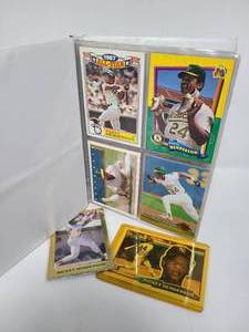 lot 140 image: Binder Full of Rickey Henderson Trading Cards