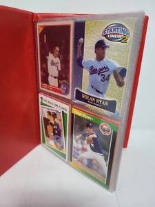 lot 141 image: Binder Full of Nolan Ryan Baseball Trading Cards