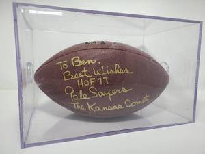 lot 23 image: Signed Gale Sayers Wilson Football in Acrylic Case with Inscription Best Wishes - HOF - Kansas Comet