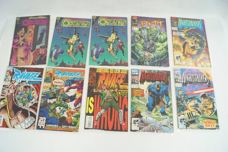 lot 2143 image: Lot of 10 Comic Books Marvel  DC Comics  Various - Heavy Hitters, Nightstalkers and Ravage 2099