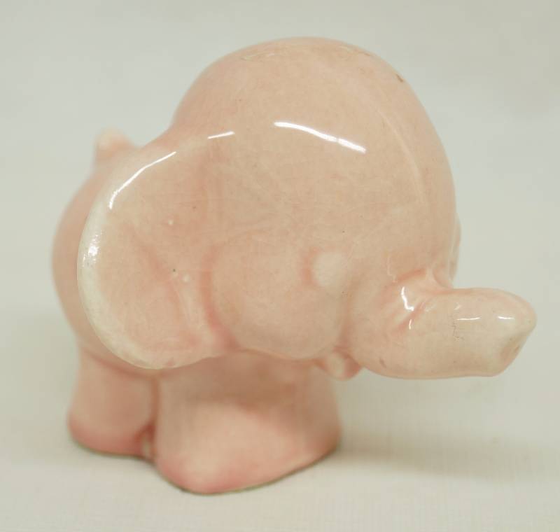 lot 1075 image: Cute Little Pink Ceramic Elephant - See Photos
