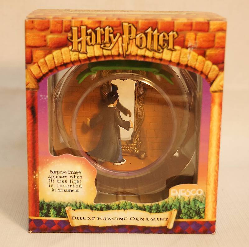lot 2044 image: Harry Potter Hanging Ornament - In the original box - NEW - A surprised image appears when you insert a light into the ornament