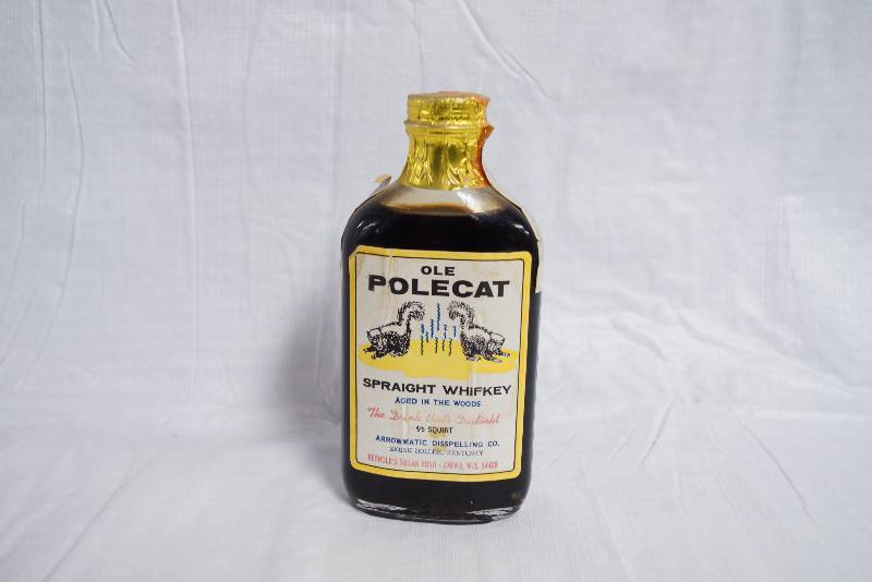lot 9075 image: Vintage Polecat Straight Wifkey Bottle w Syrup - cool spoof
