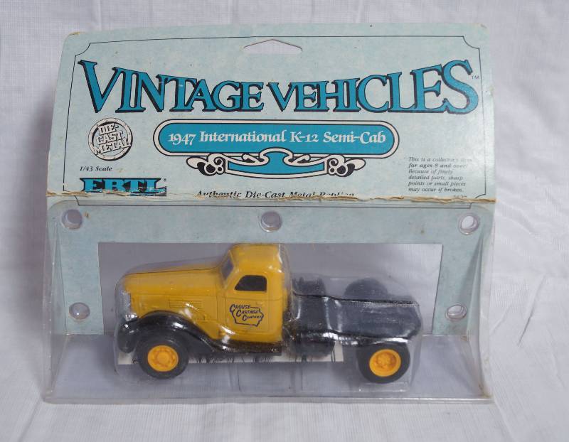 lot 9085 image: ERTL Vintage Vehicles - 1947 International K-12 Semi-Cab - Authentic Die-Cast Metal - New in Package 143 scale #2627