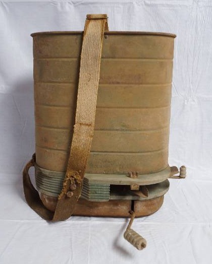 lot 9118 image: Antique metal rotary hand crank farmers seeder farm tool with canvas strap