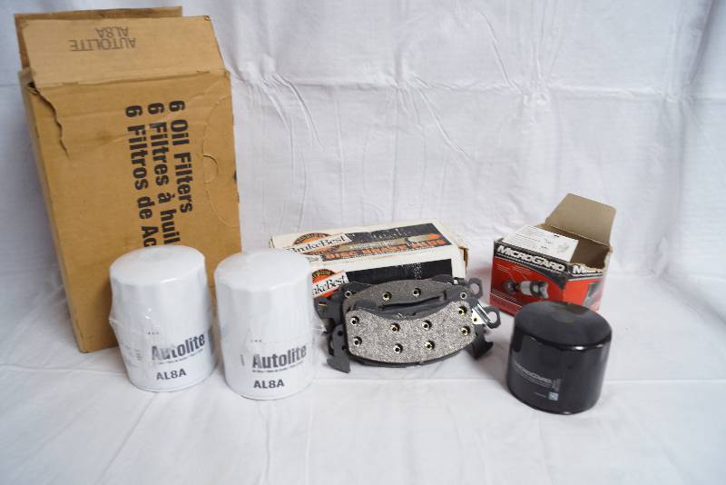 lot 9127 image: Lot of car maintenance stuff - brake pads and oil filters - see photos