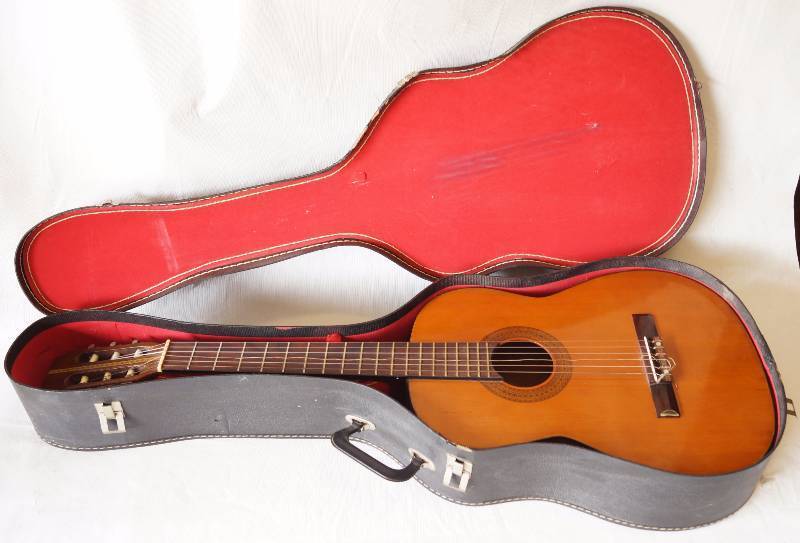 lot 6028 image: Classical Acoustic Guitar - Continental - Model# DC310 - with case. Pretty Wood Nice Condition (strings are older)
