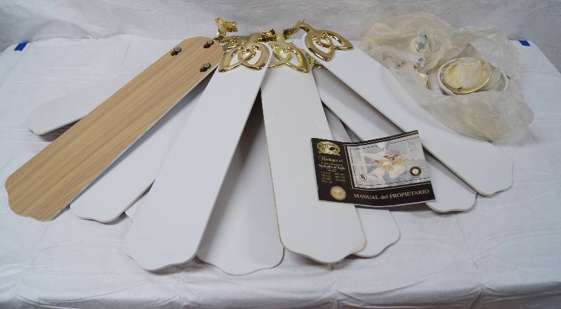 lot 9165 image: Lot of ceiling fan blades and parts - see photo