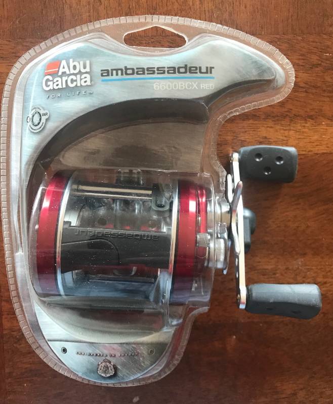 lot 3032 image: NEW Abu Garcia Ambassadeur 6600BCX Red BAITCAST FISHING REEL (Factory Sealed)