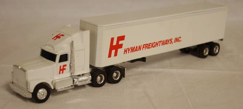lot 4240 image: ERTL - Die Cast Replica International NAVISTAR Semi Truck wTrailer Hyman Freightways 0910G