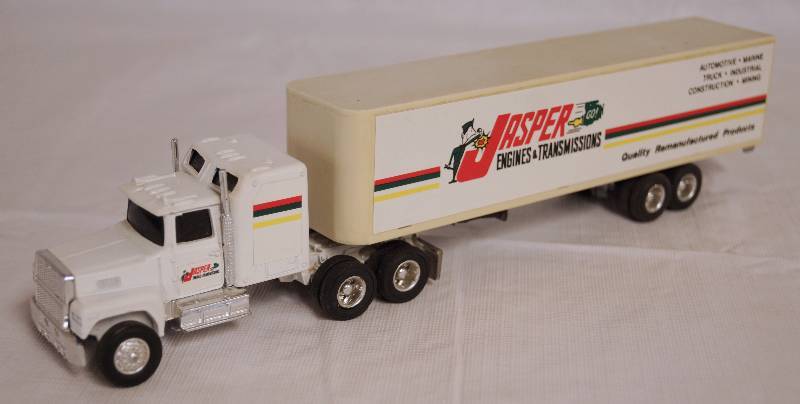 lot 4251 image: ERTL - Die Cast Replica - 164 FORD LTL-9000 wSleeper Semi Truck w Jasper Trailer 2298G