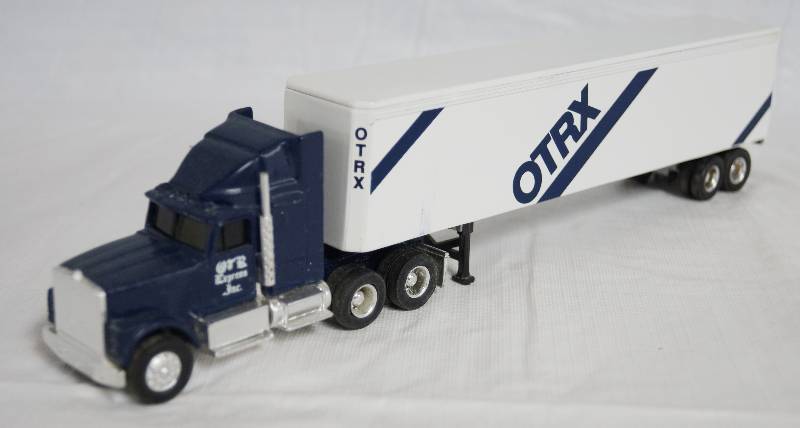 lot 4287 image: ERTL - Die Cast Replica International NAVISTAR Semi Truck wTrailer - OTR Express Inc. 2959G