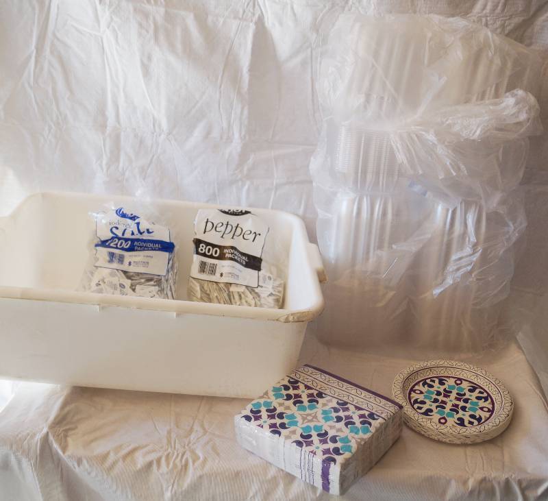 lot 4197 image: Assortment of Take Out Supplies- Napkins, Plates, Salt and Pepper, Plastic Containers