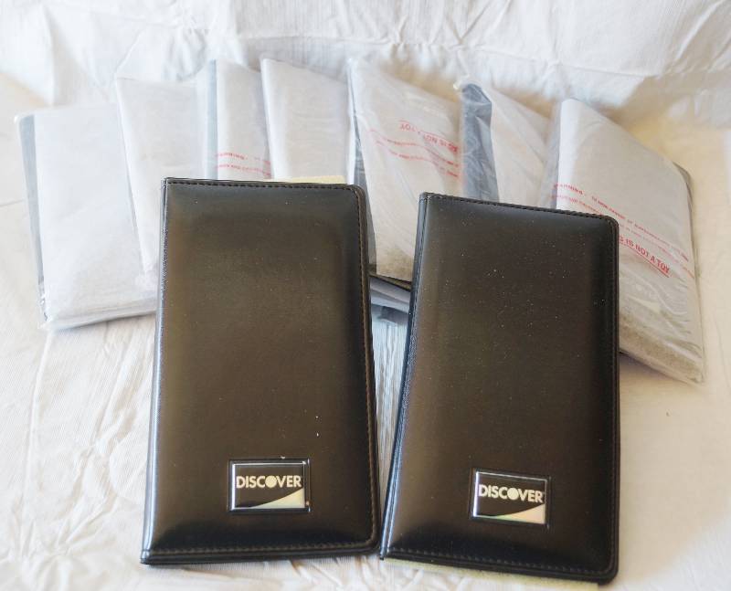 lot 4189 image: Lot of Black Discover Guest Check Booklets- Great Bundle Deal