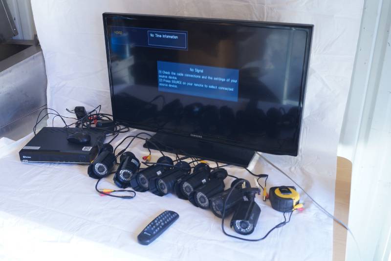 lot 4152 image: Security System Set- Includes Swann Digital Video Recorder, Samsung TV, and 8 Swann Security Cameras- WOW