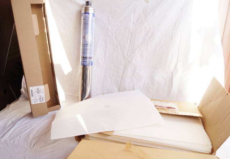 lot 4125 image: BKI Filter Bags- 13.5 x 20.5 - Model No. FI0007- AND Ecolab Water Filter Cartridge
