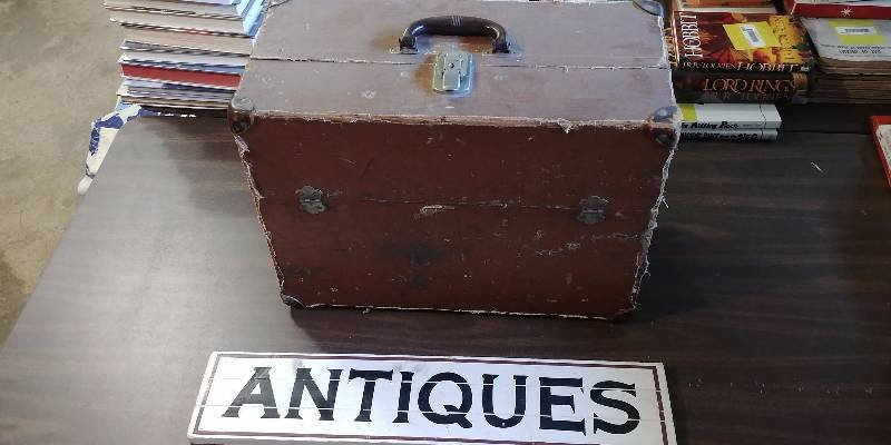 lot 317 image: Antiques Sign and Vintage Carrying Case
