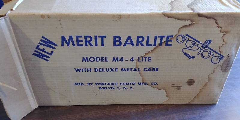 lot 7241 image: Vintage Merit Barlite with Movie Flood Bulbs