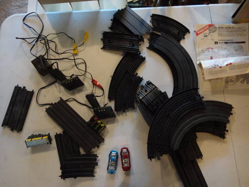lot 1008 image: Tyco Electric Racing Track, 2 Electric Race Cars, Tons of Parts