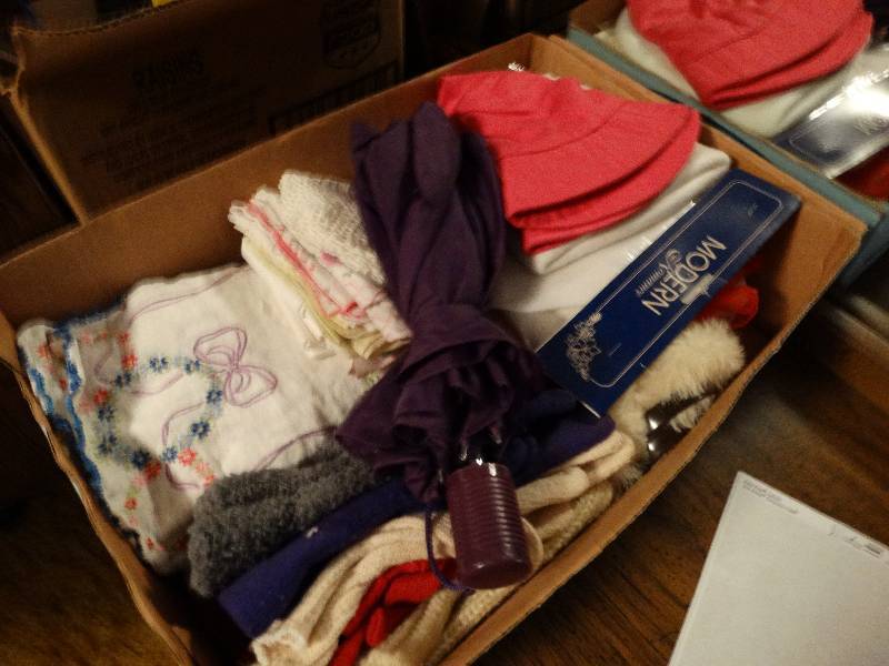 lot 776 image: Lot of hats gloves & umbrella