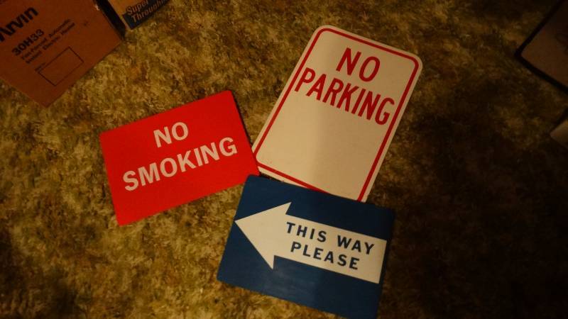 lot 554 image: 3 signs- This way please No Smoking No Parking