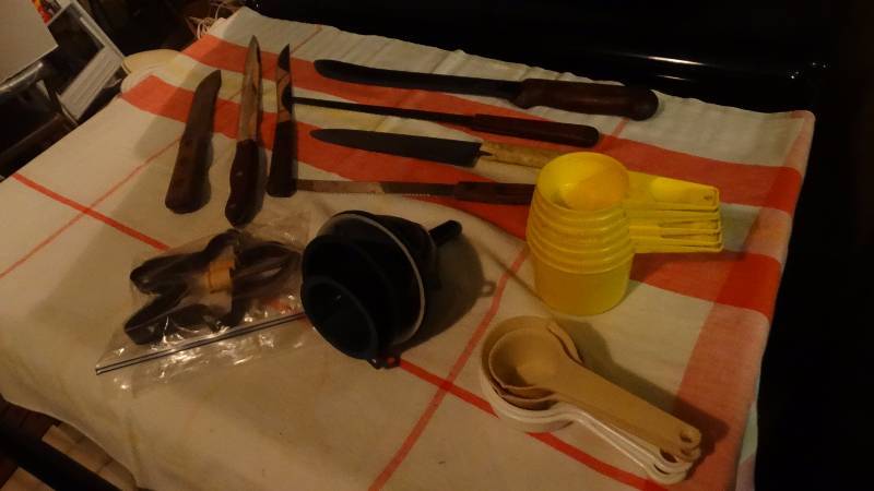 lot 617 image: Kitchen knives funnels measuring cups misc.