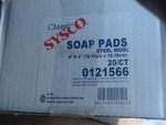 Three boxes of steel wool pads as pictured