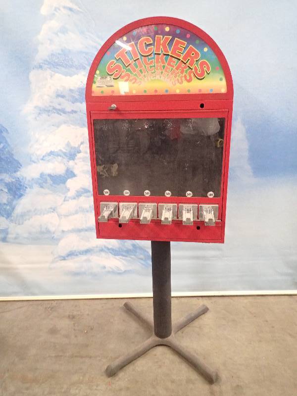 lot 21 image: 6 Stack Sticker Machine w Stand