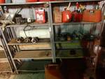 2 metal shelving units w/ remaining contents
