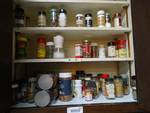 All spices & seasonings in cabinet.