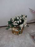 Large brass planter w/ faux flowers
